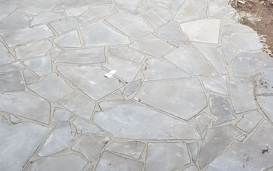 Crazy pave patio beside a timber deck
