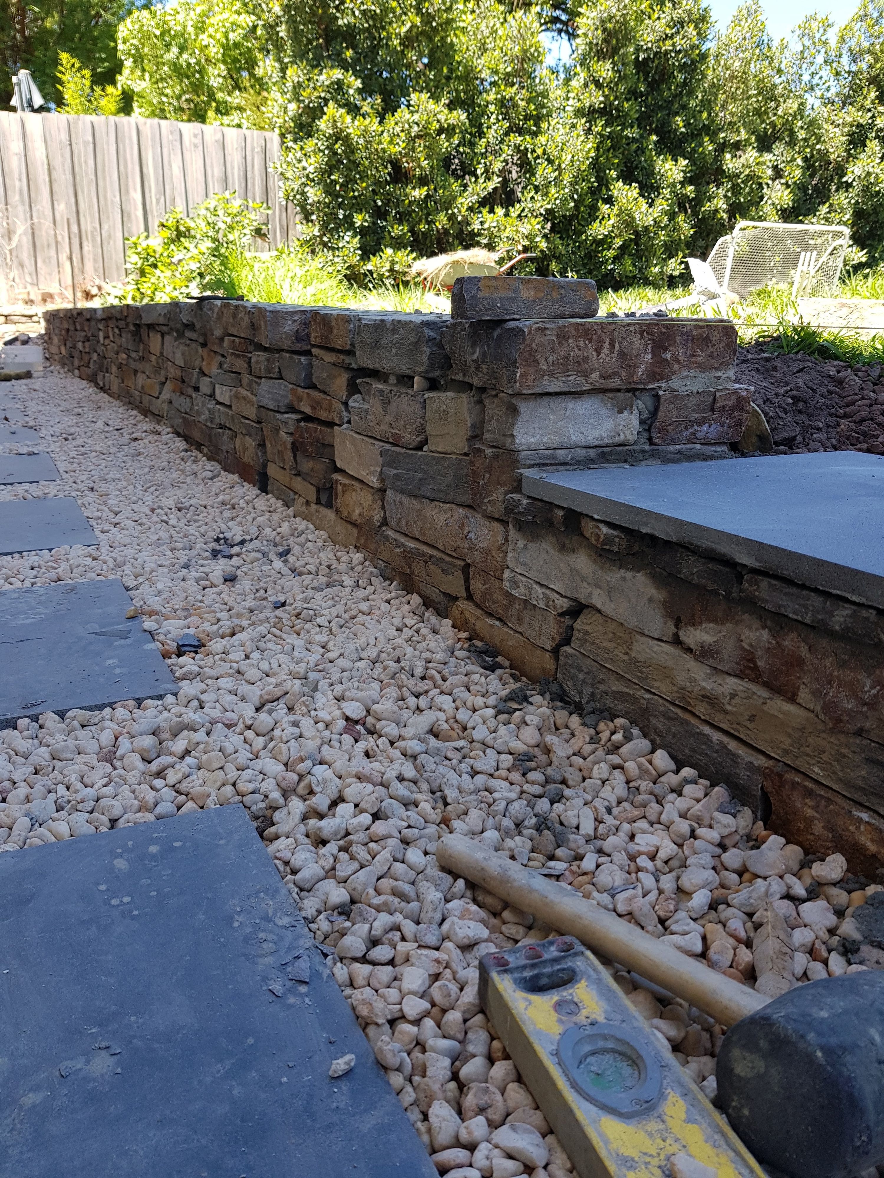 Finished exposed aggregate driveway at a completed home