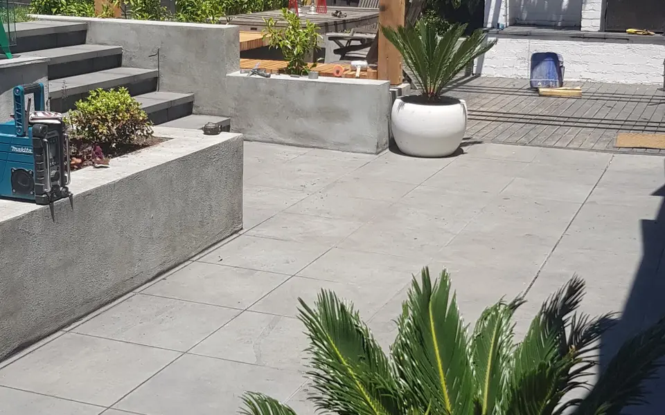 Concrete slab being finished between formwork